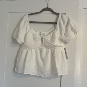 White Peplum Blouse with Square Neckline and Puff Sleeves